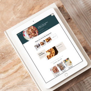 ipad with website on it sitting on a wood table