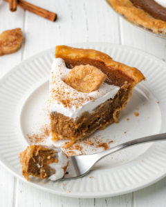 slice of pie on a plate with a bite on the fork